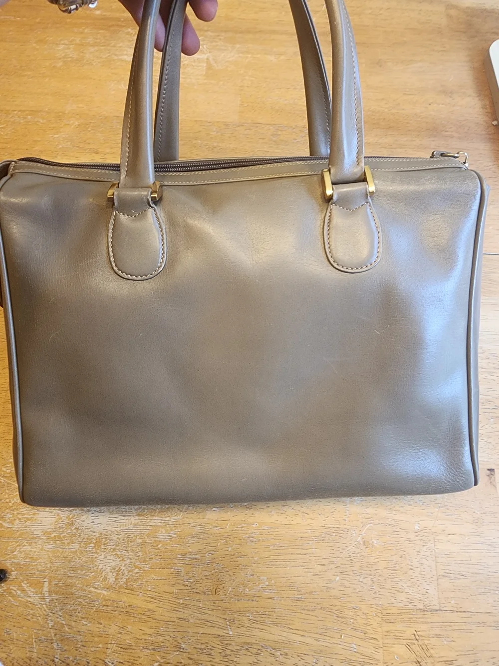 vintage Gucci Interlocking G Top Handle Bag, crafted from neutral beige leather